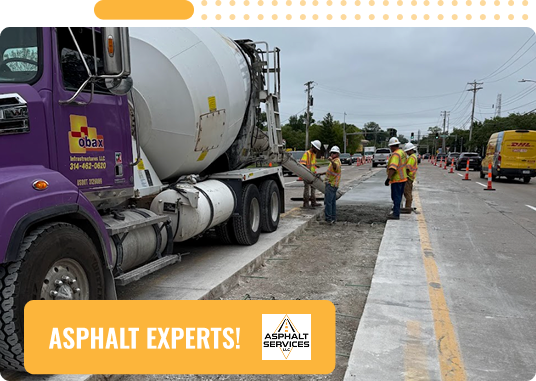 Several construction workers in safety vests work beside a purple cement truck on a partially paved road, with traffic cones and vehicles in the background. Text reads, ASPHALT EXPERTS! Commercial Asphalt & Concrete Services in St Louis MO.